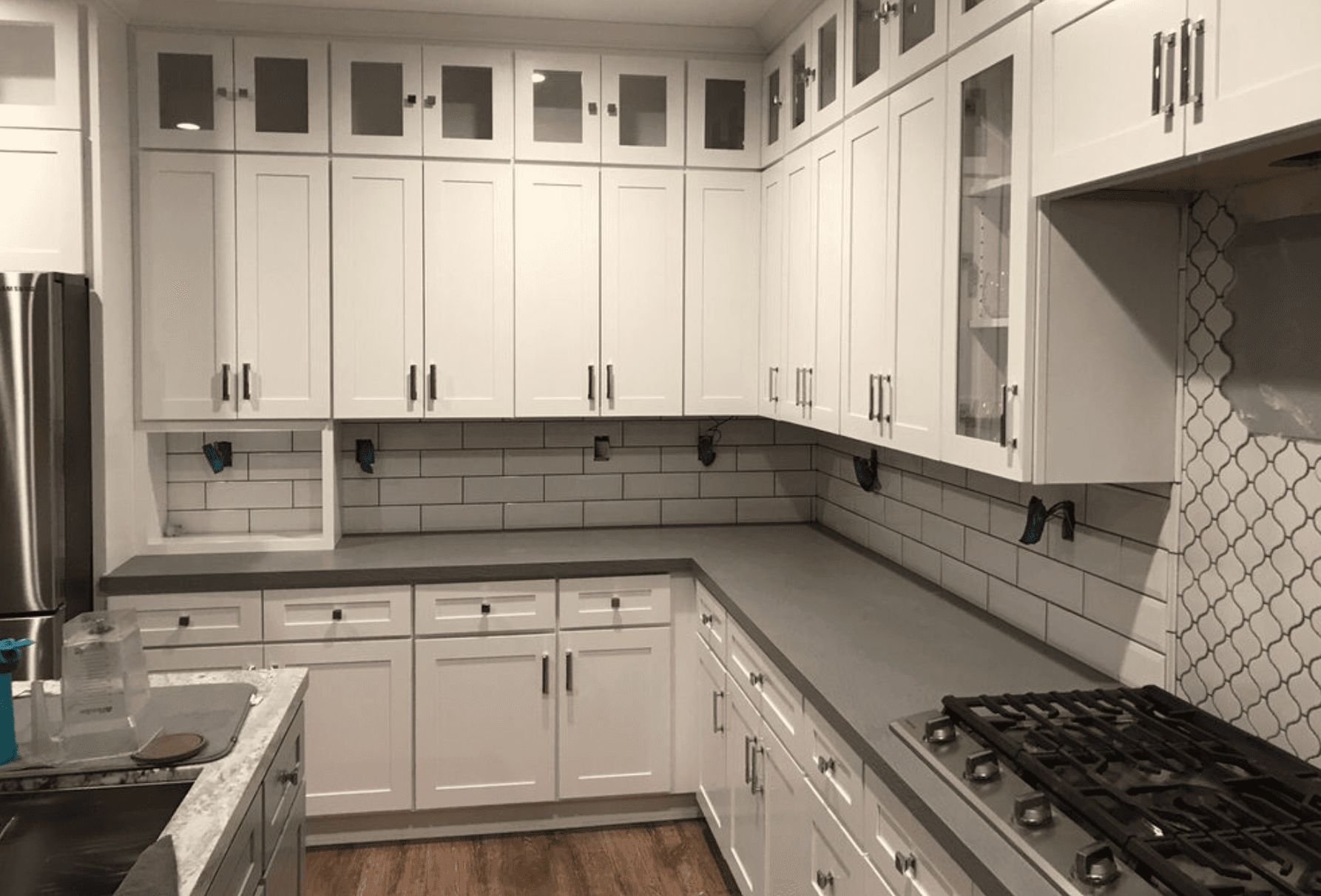 Kitchen tile backsplash project by J & H Flooring