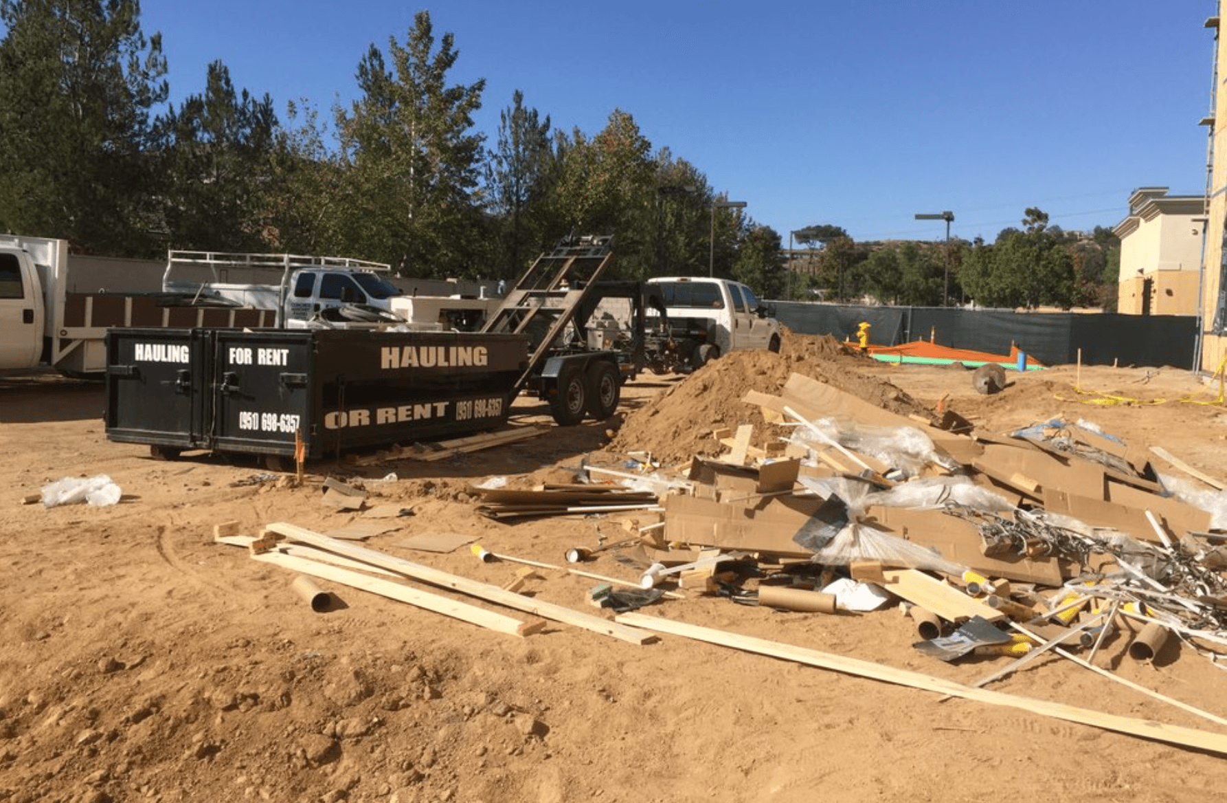 Jobsite cleanout with Maximum Cleaning hauling equipment
